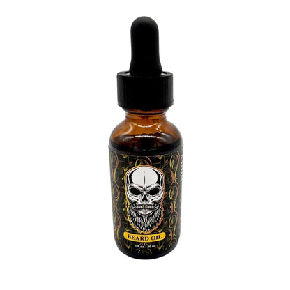The photo depicts a bottle of El Barber Beard Oil. The bottle is amber with a black dropper cap. The label features a detailed design, including a prominent skull with a full beard. It also states "Beard Oil" and "1 fl oz / 30 ml" in yellow text. The overall design is bold and visually striking, reflecting the brand's edgy style.